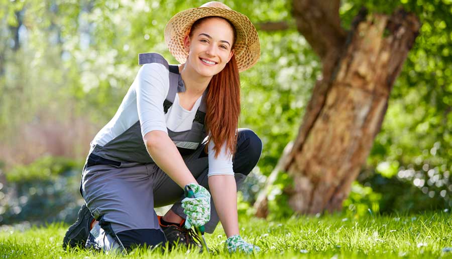 Young woman working in the garden